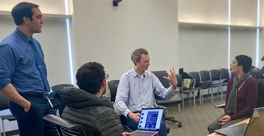Fellows prepare to undergo mock interviews where they will present their research in a way the general public can understand.