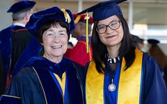 Chancellor Leland with student speaker Santana Juache.