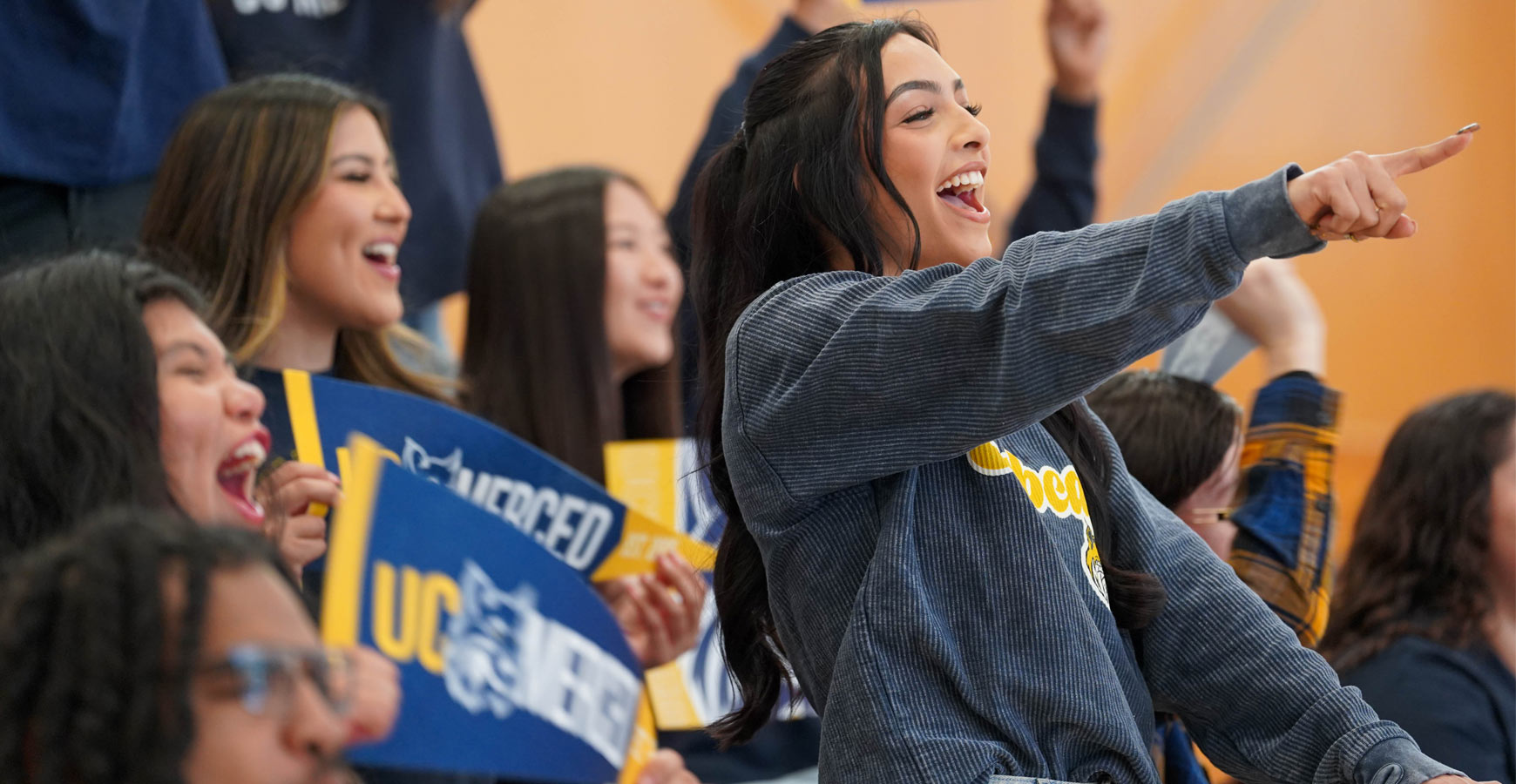 Students cheering from the stands