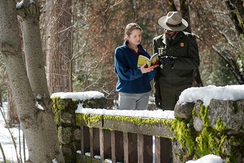 Shakespeare in Yosemite - actor and director conferring over script