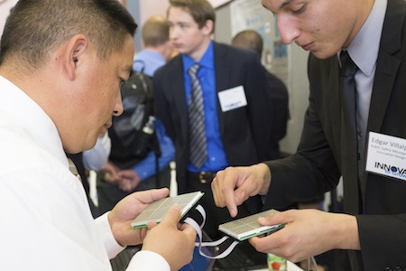 Student explains project to judge at last year's Innovate to Grow.