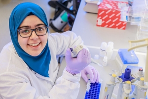 A picture of Asmaa Mohamed in a lab